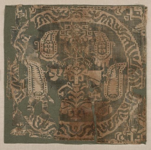 Roundel from a Tunic with Palmette Tree