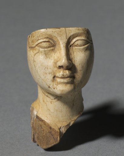 Face from a Cosmetic Spoon