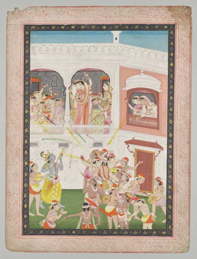 Radha and Hindu God Krishna celebrating the festival Holi