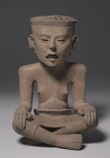 Seated Figure Wearing a Skin