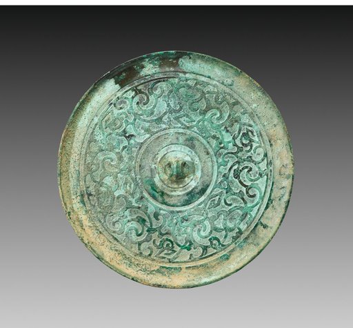 Mirror with Serpentine Interlaces and Angular Meanders