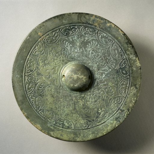 Mirror with Quatrefoil, Paired Phoenixes, and Auspicious Animals