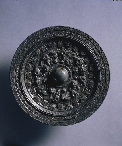 Mirror with Deities and Animals Surrounded by Rings of Squares and Semicircles