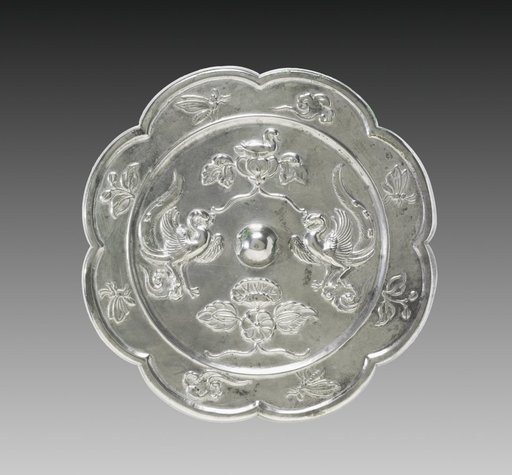 Lobed Mirror with Paired Phoenixes, a Nestling Bird, and a Lotus Blossom