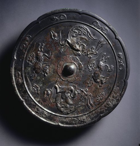Lobed Mirror with Paired Phoenixes and Auspicious Animals