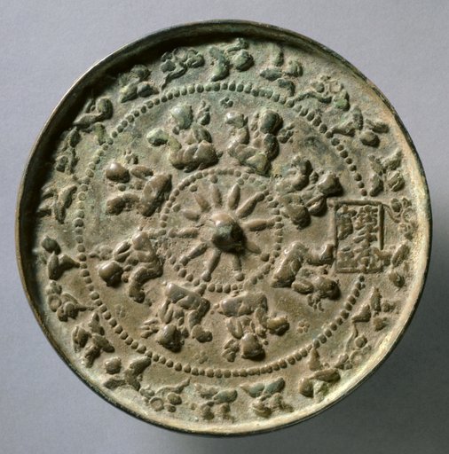 Mirror with Wheel Spokes and Riding Boys