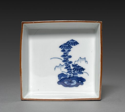 Side-Dish with Dandelion in Rocks