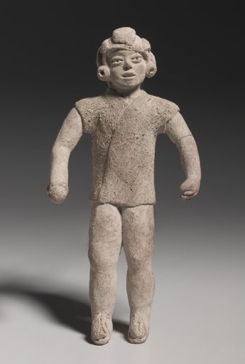 Figurine Holding A Ball(?)