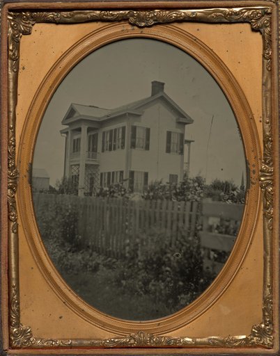 Homestead with picket fence and flowers