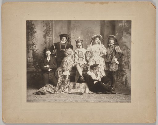 Untitled (theatrical scene with seven costumed figures)