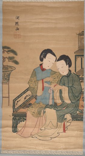 Two Beauties Inspect a Golden Lotus