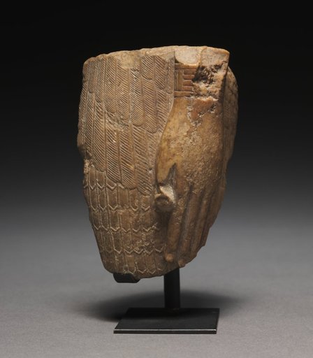 Fragment of a Feather-Garmented Figure