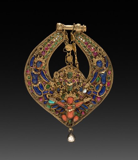 Deity Earring with Vishnu on Garuda (front) and chepu (monster mask) (back)