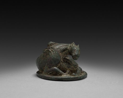 Weight in the Form of a Coiled Animal