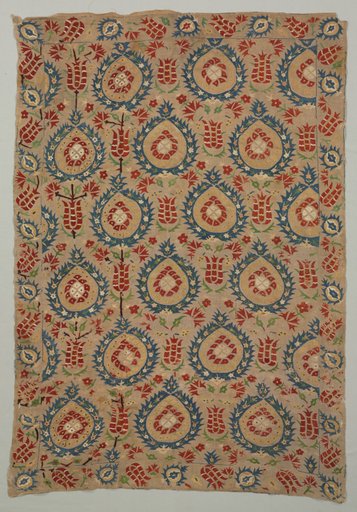 Embroidered quilt with pomegranates and tulips