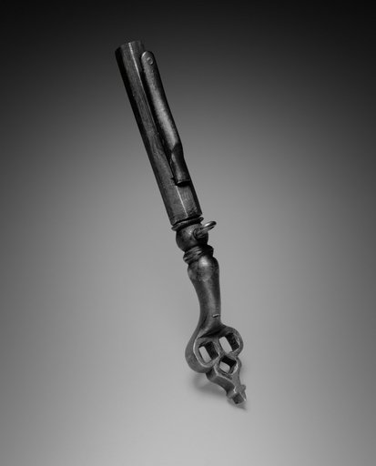Combined Wheel-Lock Spanner and Powder Measure