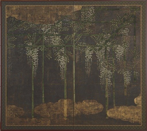 Blossoming wisteria on a bamboo trellis