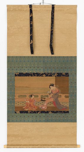 Two girls on a balcony overlooking the sea