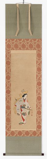 Dancer in a white dress, patterned with colored leaves and flowers