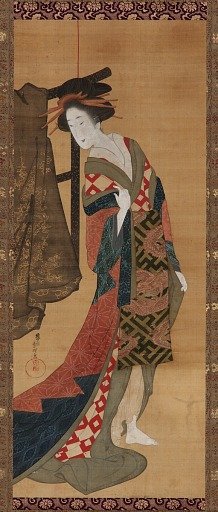 A courtesan standing near a clothes rack