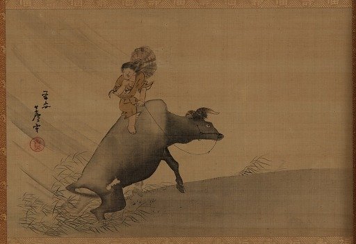 Herdboy on a water-buffalo in a rainstorm
