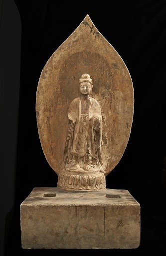 Buddhist tablet: standing figure in high relief; right hand missing