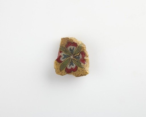 Fragment of an inlay