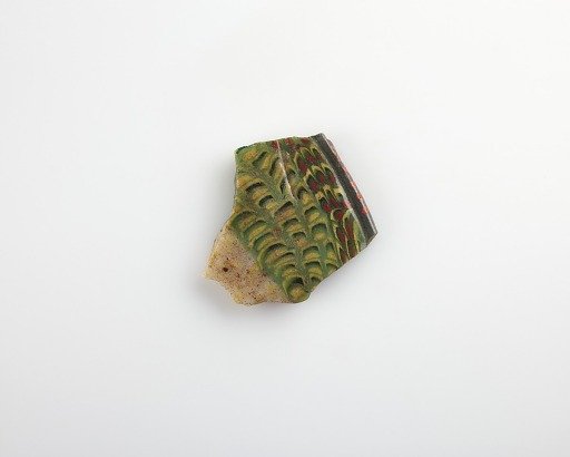 Fragment of an inlay with fish design