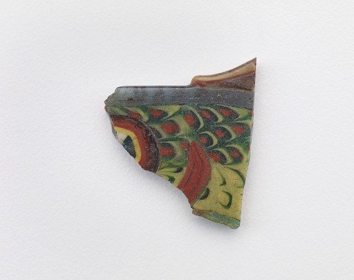 Fragment of an inlay with fish design