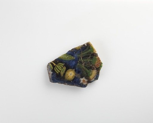 Fragment of an inlay plate, with a floral design