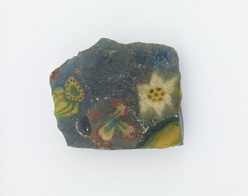 Fragment of an inlay with floral design