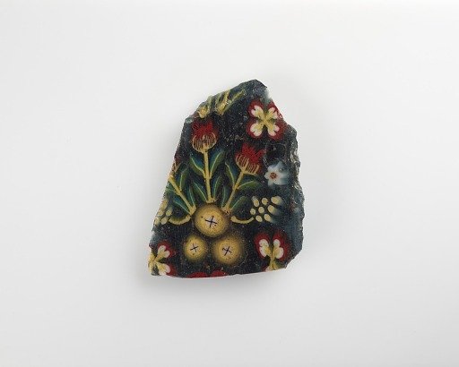 Fragment of an inlay with a floral pattern