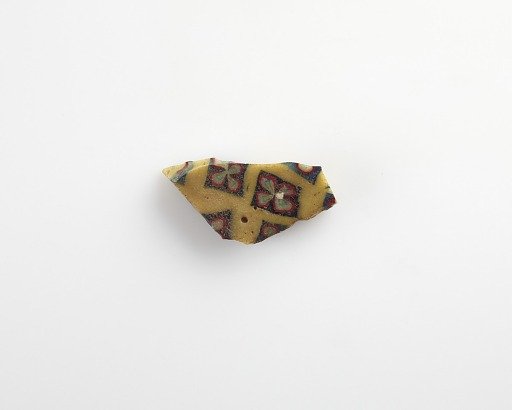 Fragment of an inlay