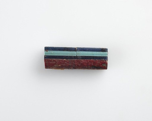 Fragment of a bar used for inlay