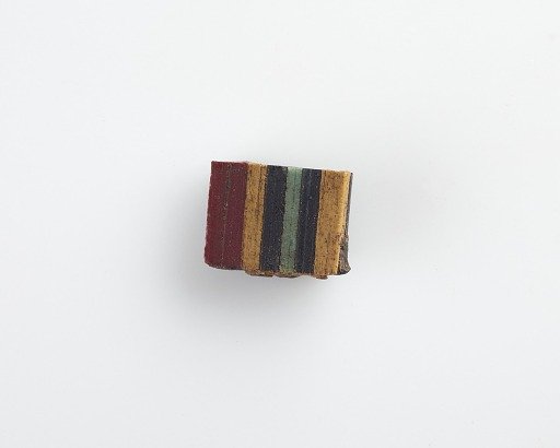 Fragment of striped inlay