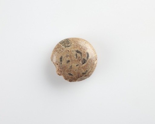 Button bead. One side fragmentary