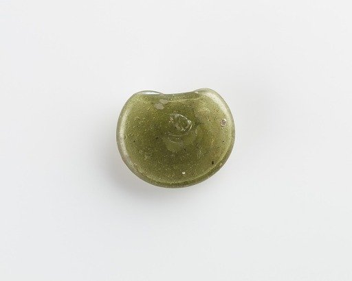 Irregular disk (amulet ?)