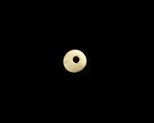 Bead, partly decayed