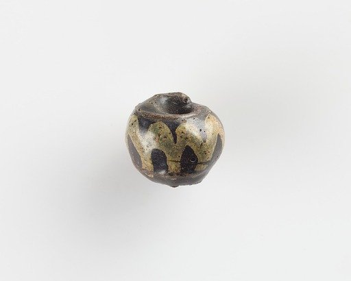 Bead, with a large bore. Chipped
