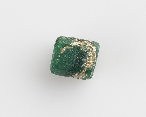 Bead, flattened tubular