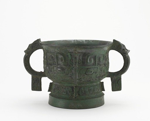 Ritual grain server (<em>gui</em>) with masks