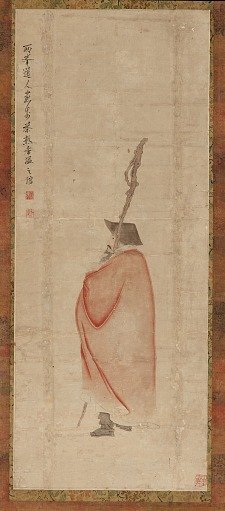 Standing man in a red coat