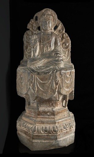 Seated Buddhist figure: high octagonal pedestal and perforated background