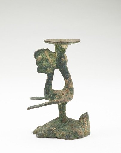Lamp in the form of a bird standing on a tortoise