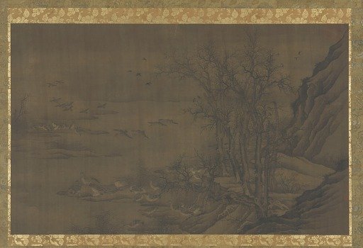 Geese at dawn on a misty river