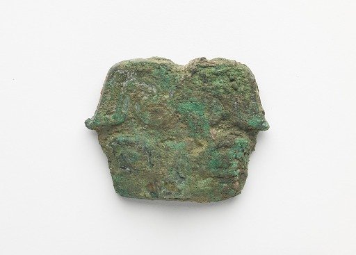 Ornament, with a bar across the back for attachment