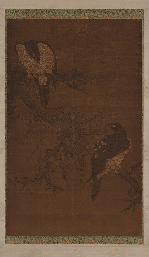 Two hawks on a withered bough