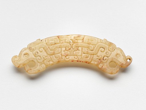 Pendant with dragon heads, interlaced dragons, and mask