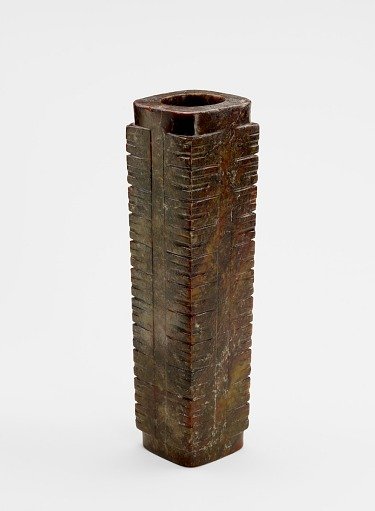 Eleven-tier tube (<em>cong</em> 琮) with masks