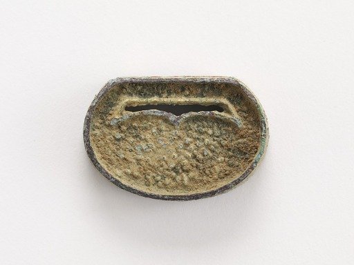 Belt ornament (part of a group of ten: F1916.428-429, 726-730, 740, 743-744)